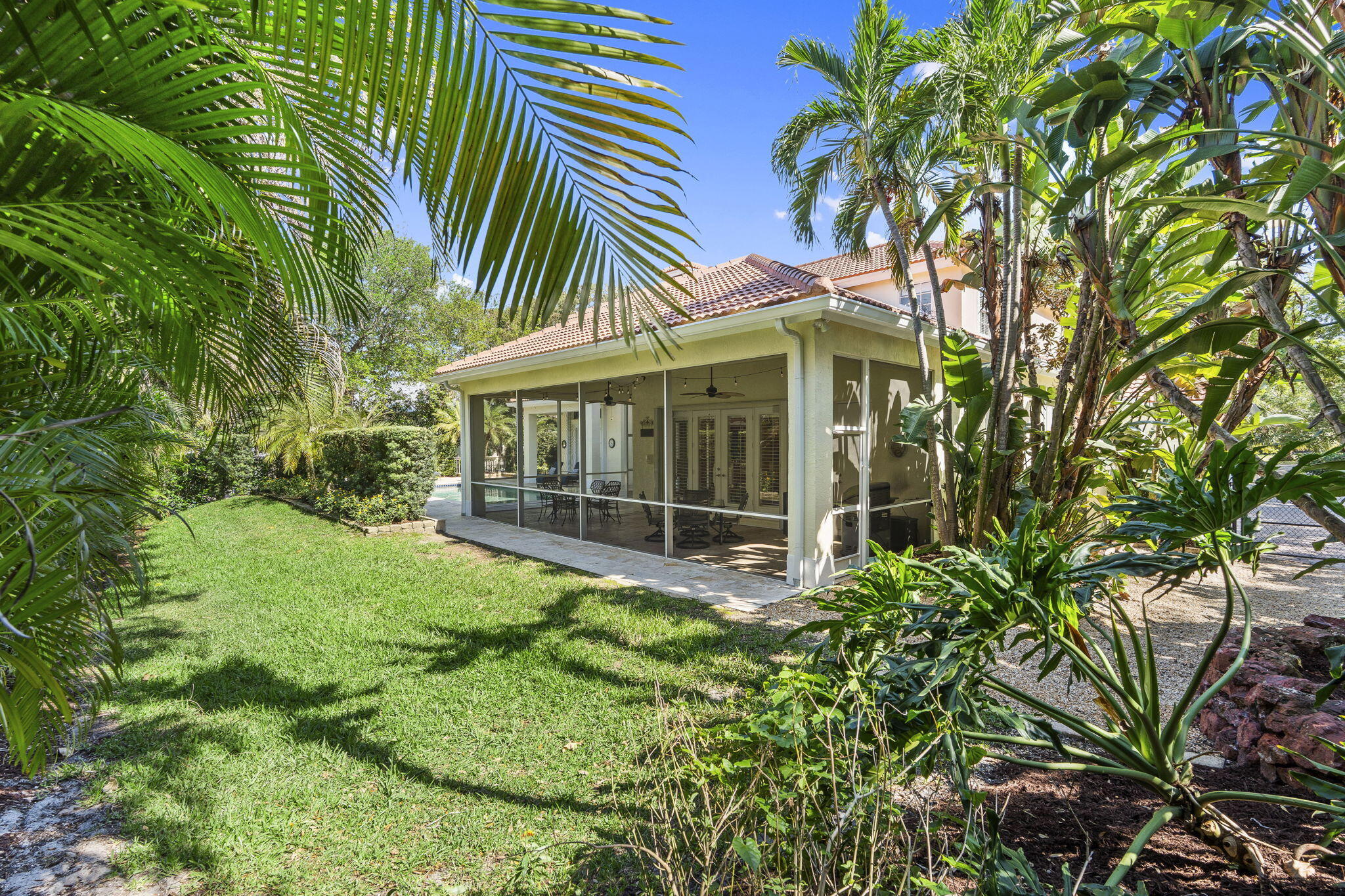 4 Castle Hill Way Stuart, FL 34996 - Photo 45 of 52 a view of a house with a yard