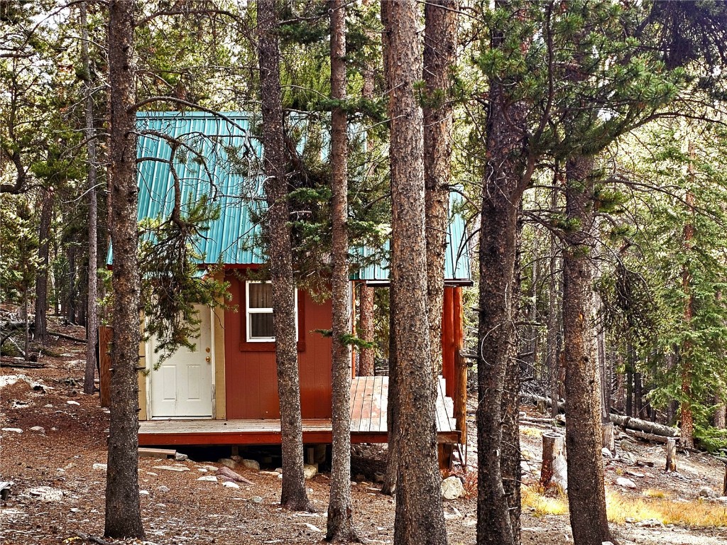 102 Gold Trail Fairplay, CO 80440 - Photo 4 of 13 a view of a house with a tree