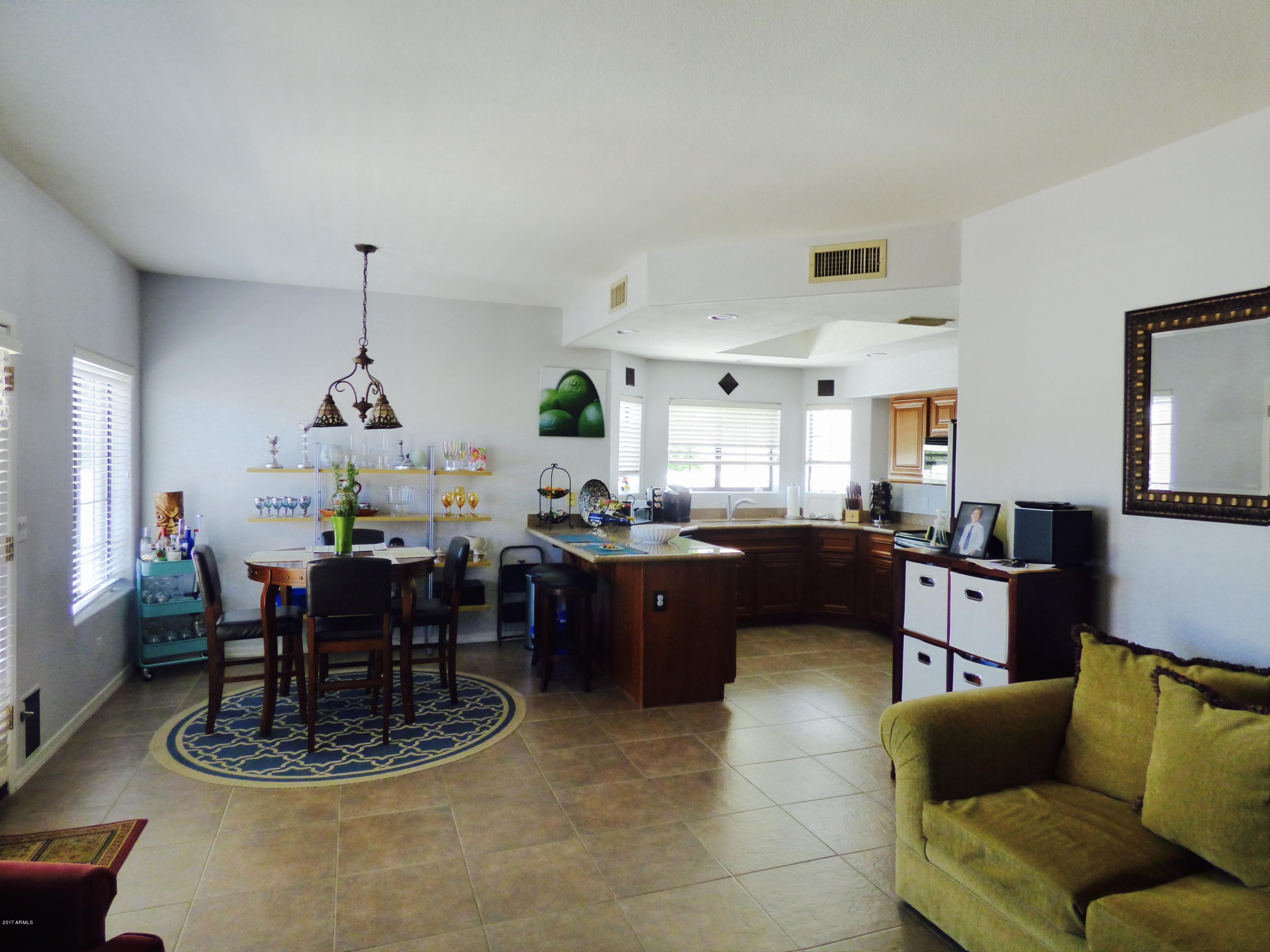 1001 East Griswold Road, Unit 2 Phoenix, AZ 85020 - Photo 23 of 29 family room to kitchen