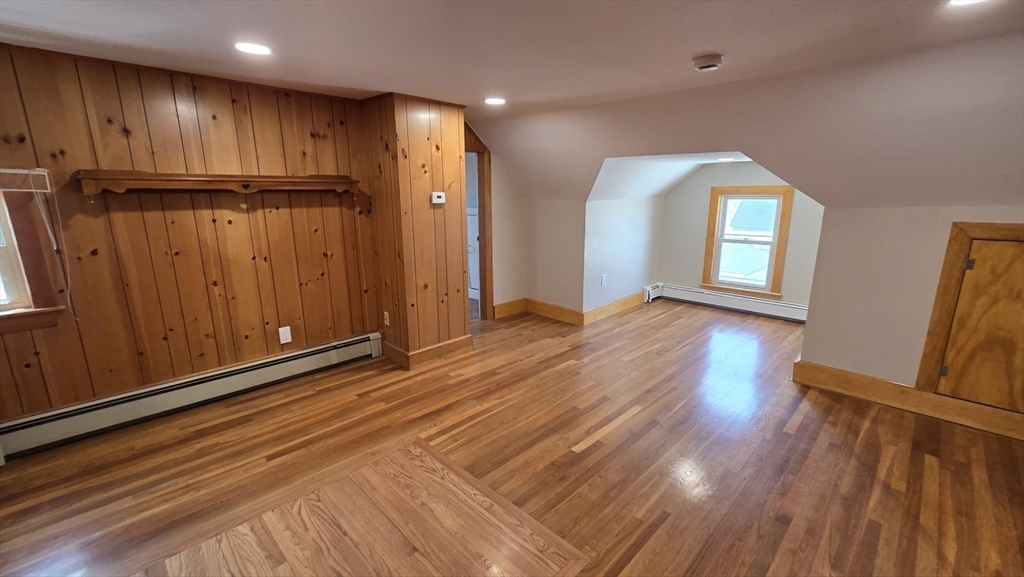 63 Carroll Street, Unit 2 Chelsea, MA 02150 - Photo 8 of 19 a view of a livingroom with wooden floor