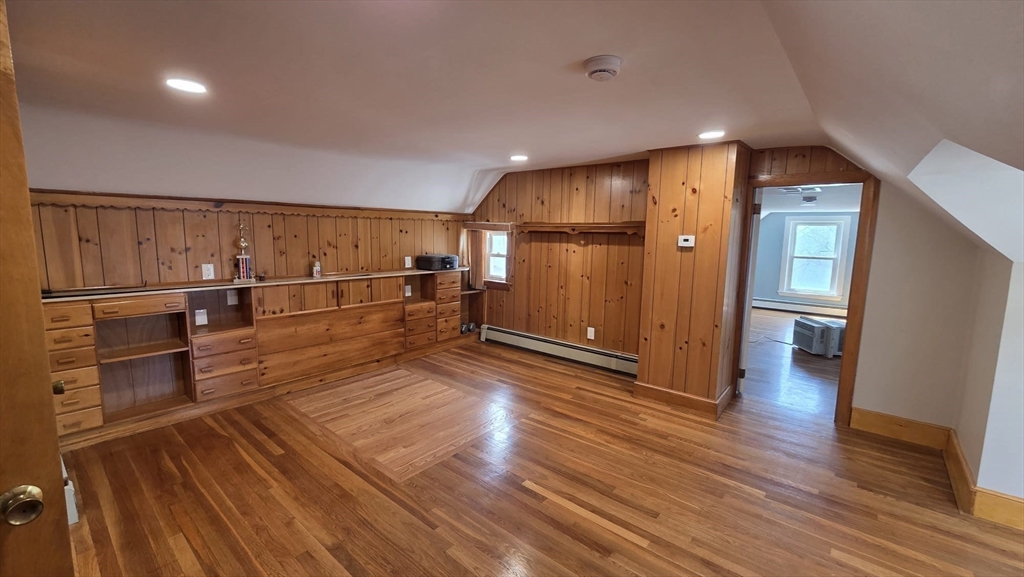 63 Carroll Street, Unit 2 Chelsea, MA 02150 - Photo 9 of 19 a view of a kitchen with wooden floor and a kitchen