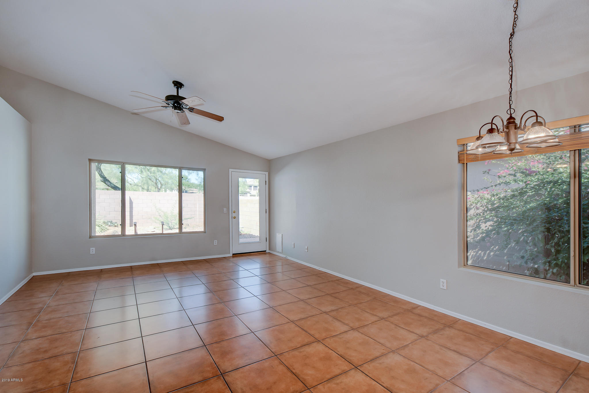 4404 East Rowel Road Phoenix, AZ 85050 - Photo 8 of 15 a view of an empty room with a window