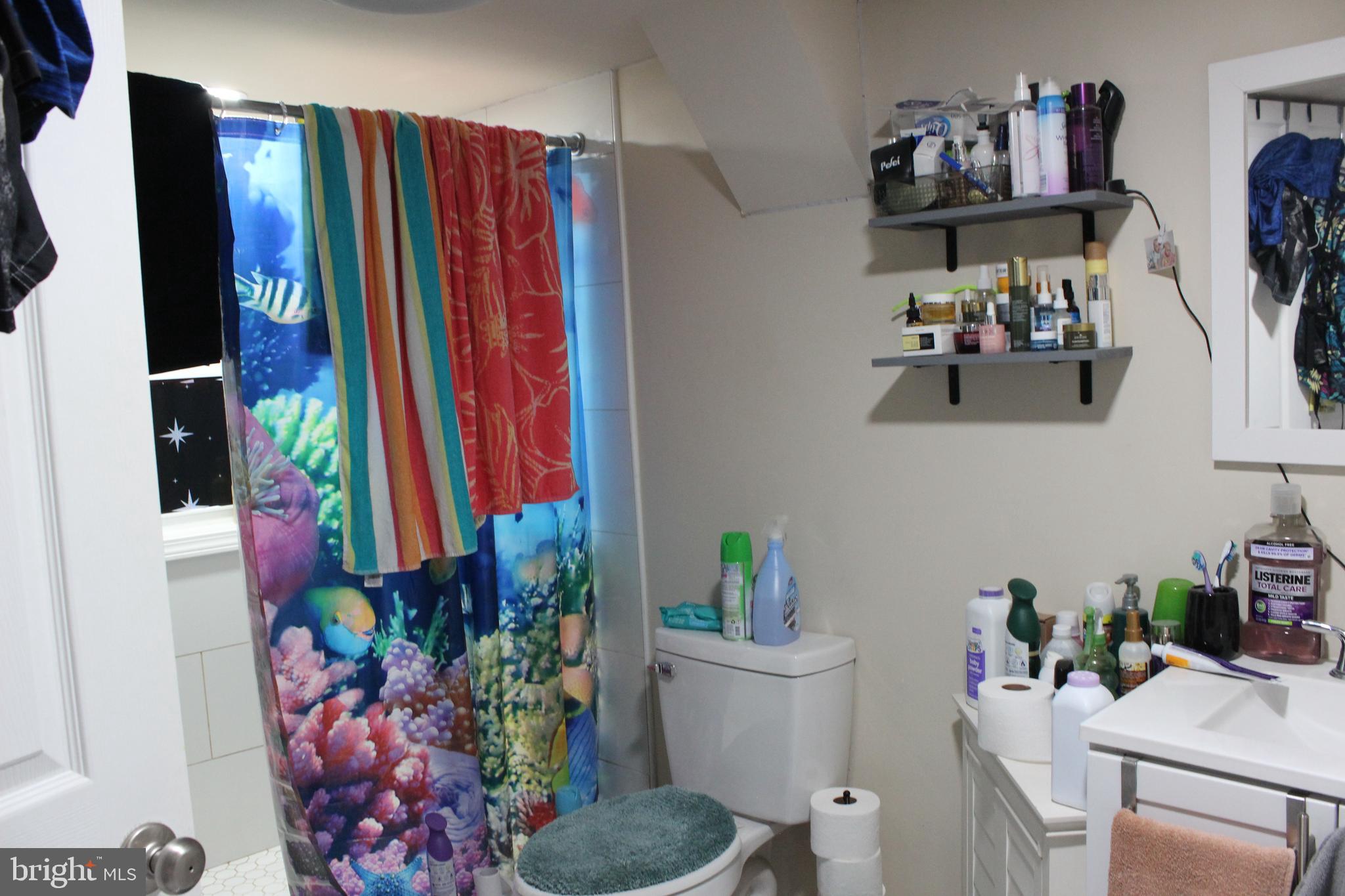 2740 Belsches Road Bumpass, VA 23024 - Photo 14 of 15 a living room with furniture and a large window