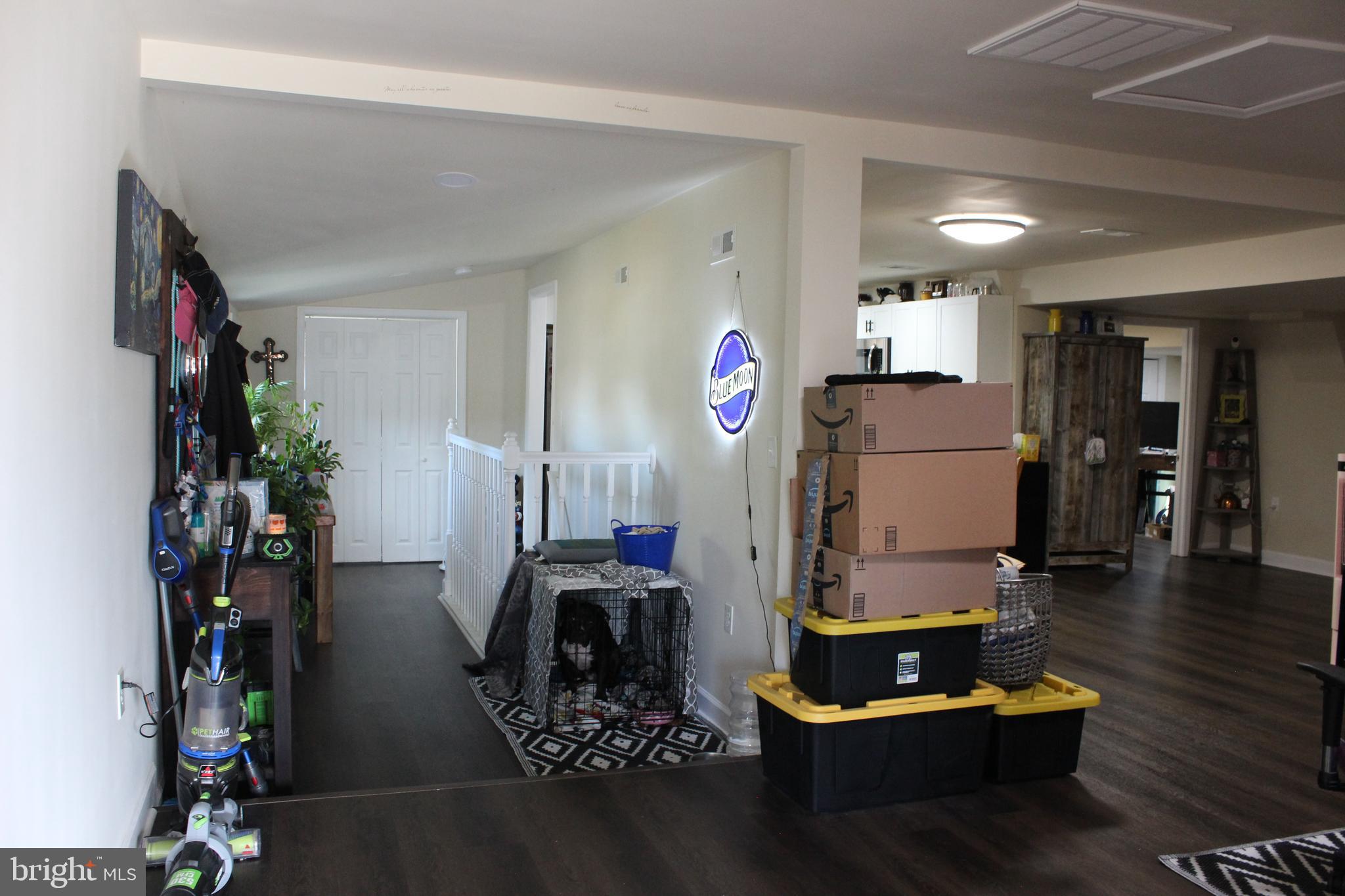 2740 Belsches Road Bumpass, VA 23024 - Photo 8 of 15 a living room with furniture and a flat screen tv