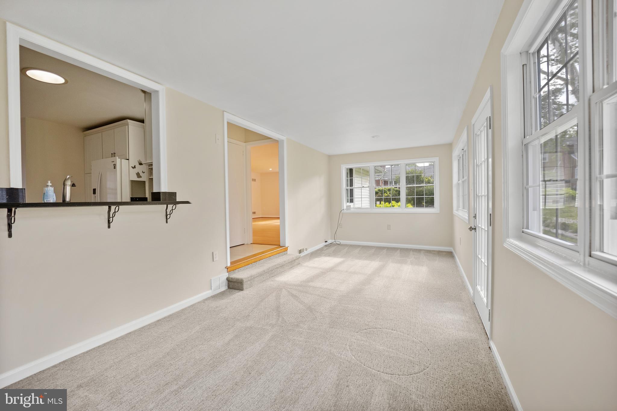 705 Halstead Road Wilmington, DE 19803 - Photo 14 of 34 wooden floor in an empty room with a window