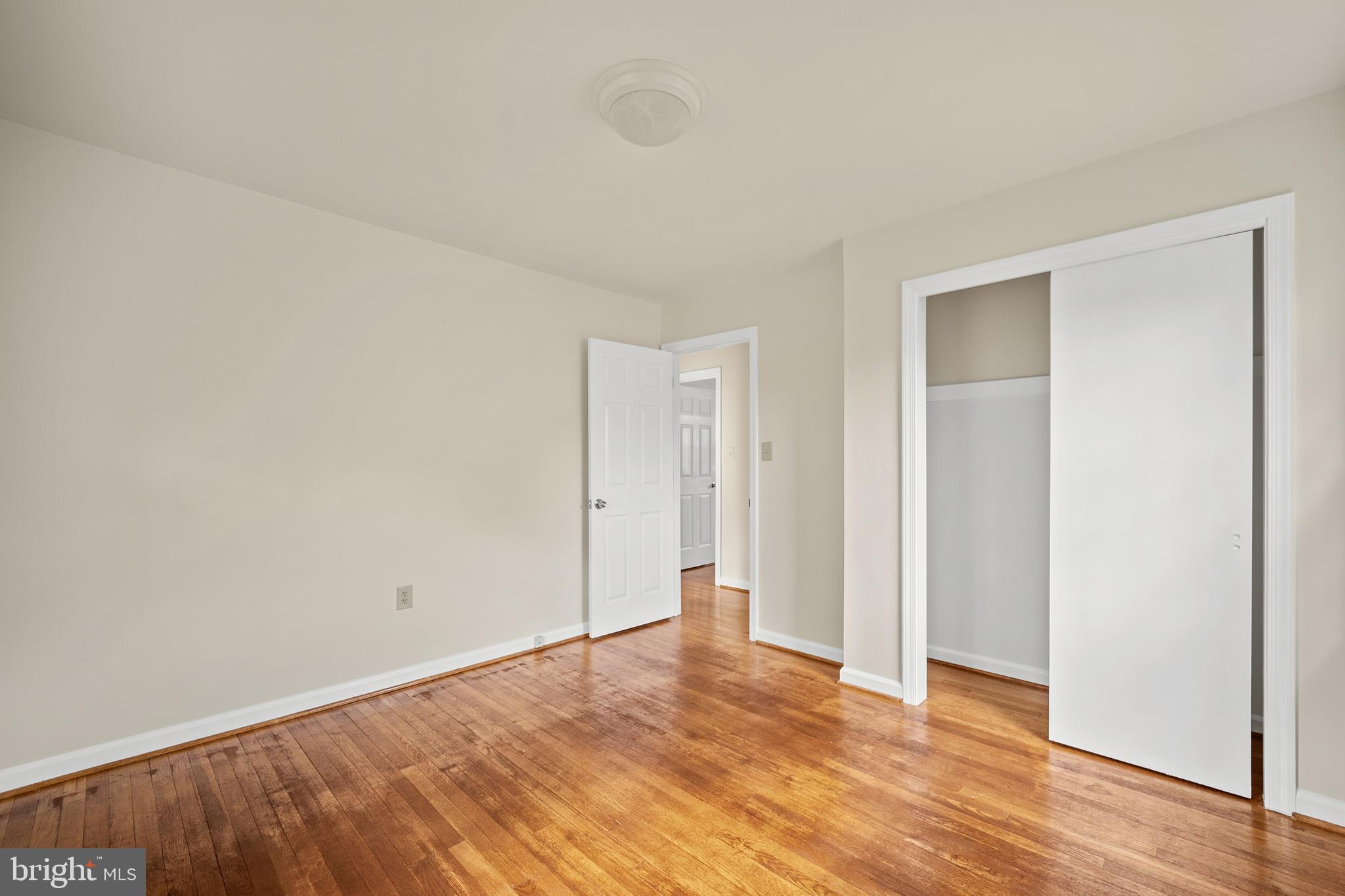 705 Halstead Road Wilmington, DE 19803 - Photo 23 of 34 an empty room with wooden floor and closet