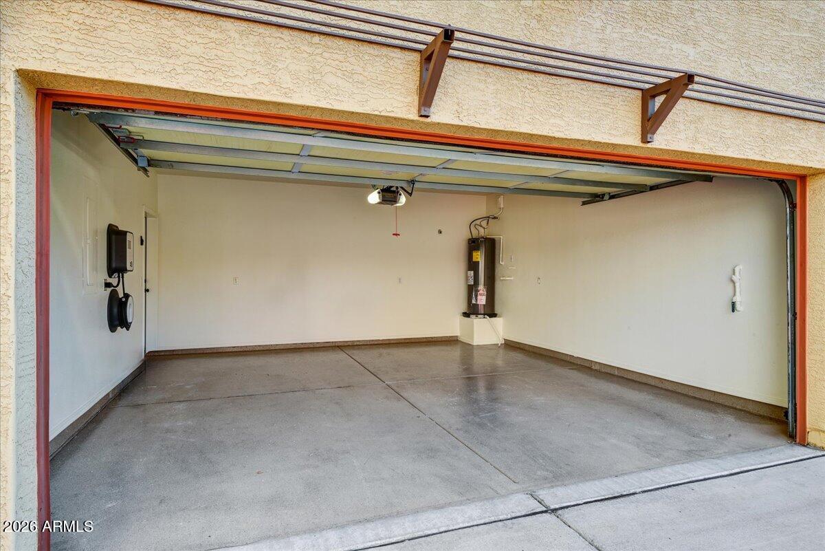 2929 North 37th Street, Unit 7 Phoenix, AZ 85018 - Photo 3 of 15 Epoxied 2-car garage with EV charger.
