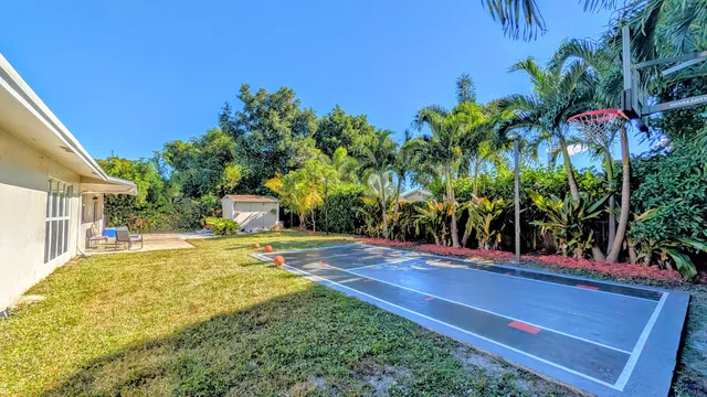 a living room with furniture or couch and a flat screen tv