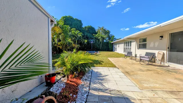 a bedroom with a bed and a mirror