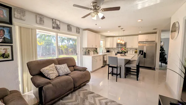 a bedroom with bed and a window