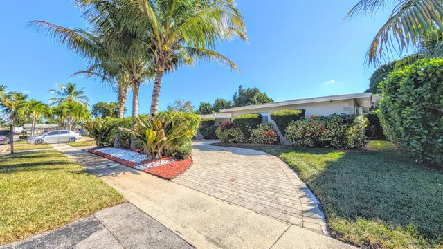 a view of swimming pool with a yard