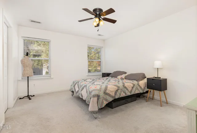a room with furniture and a wooden floor