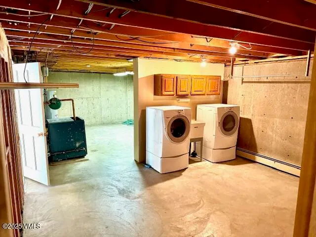 a view of an empty room with a staircase