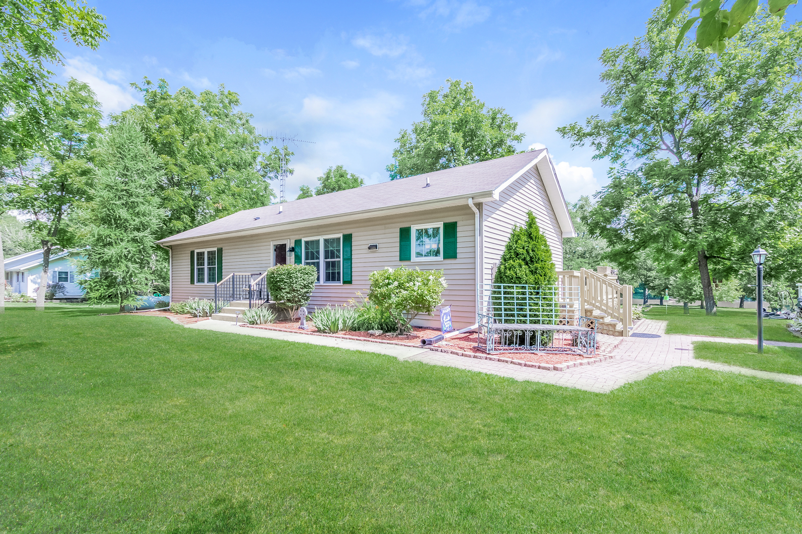 7911 South Sugar Island Road Chebanse, IL 60922 - Photo 1 of 16 a view of a house with a yard and porch