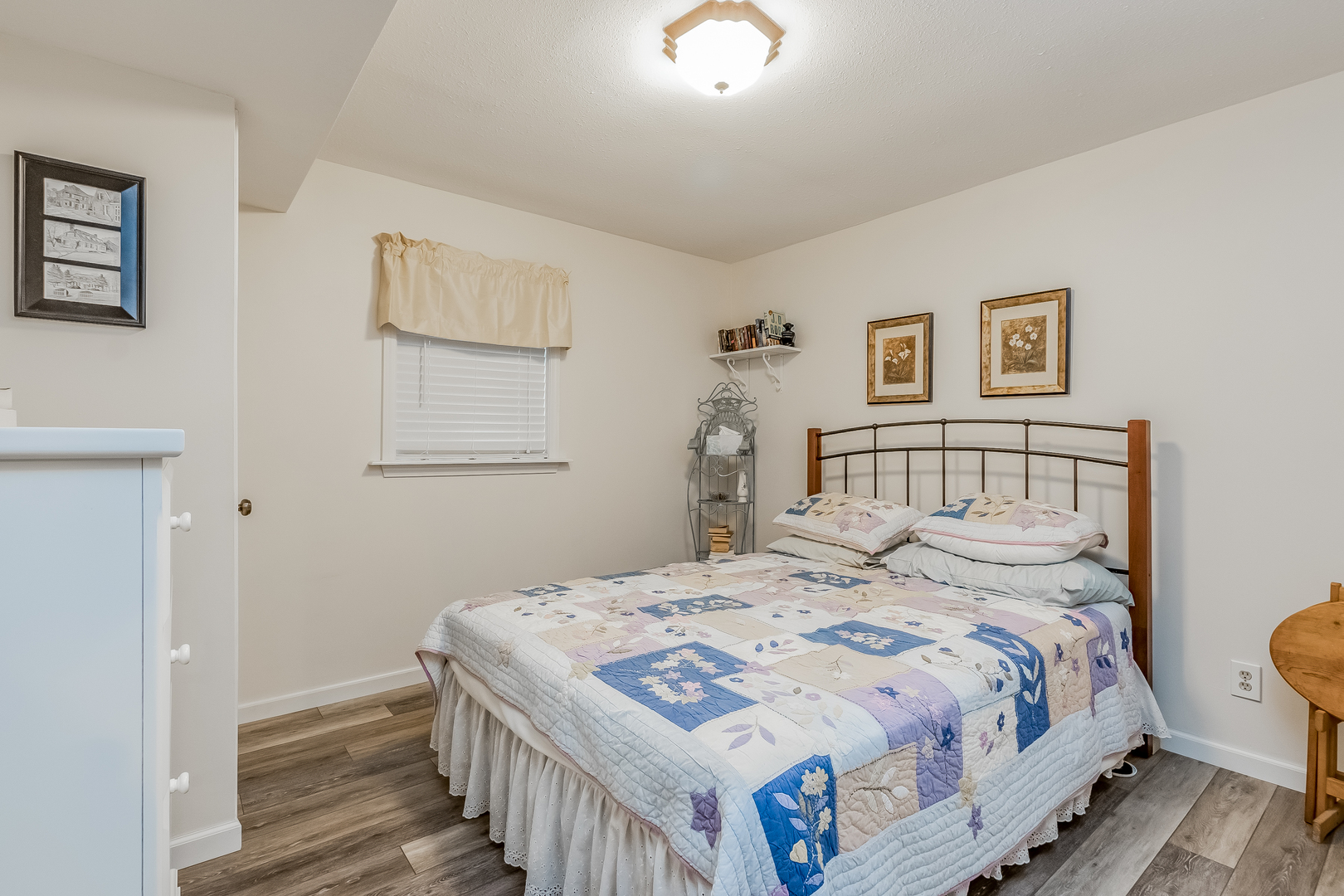 7911 South Sugar Island Road Chebanse, IL 60922 - Photo 14 of 16 a bedroom with a bed and a lamp