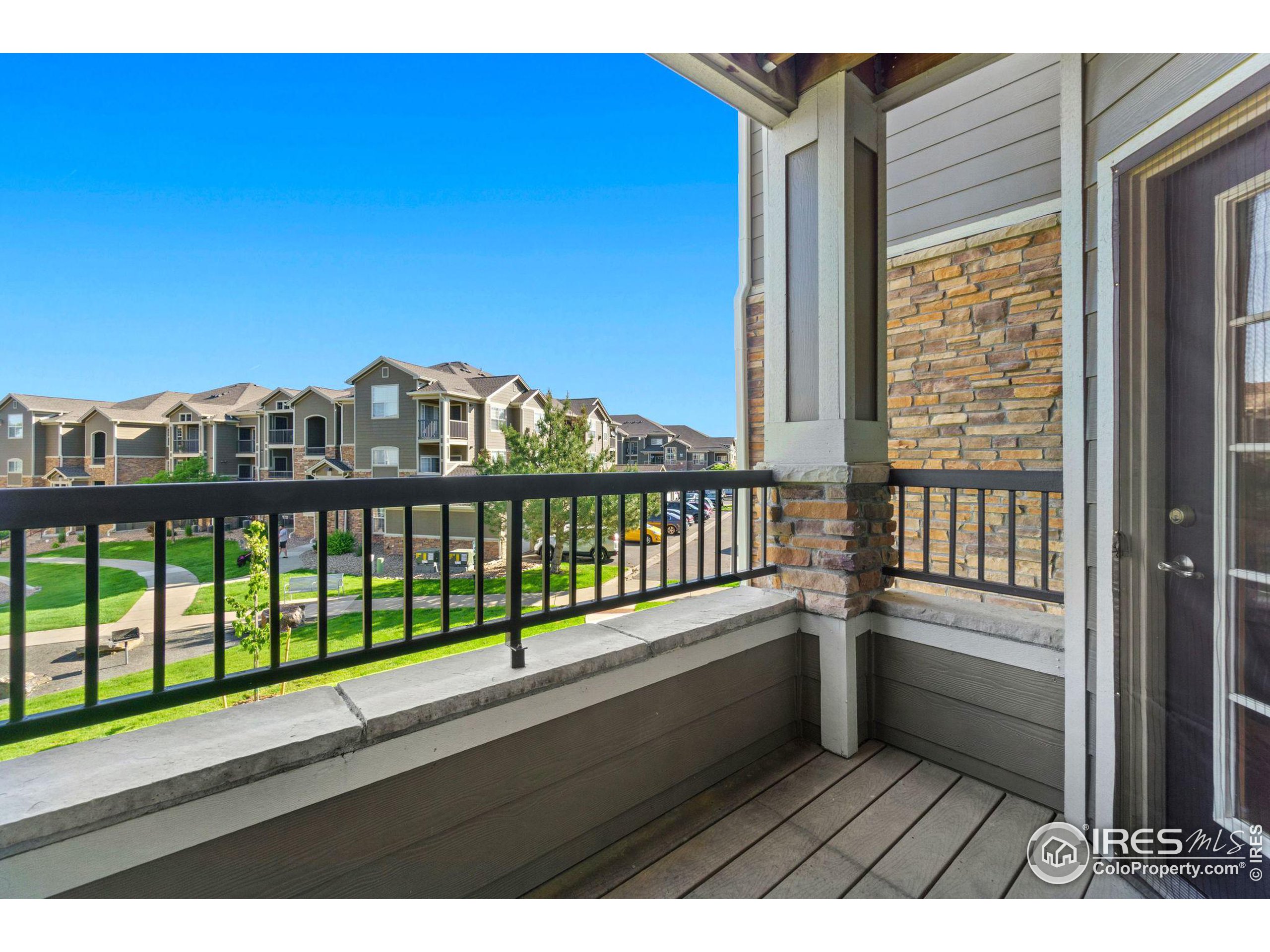 Undisclosed Address Erie, CO 80516 - Photo 12 of 20 a view of a balcony with a lake view