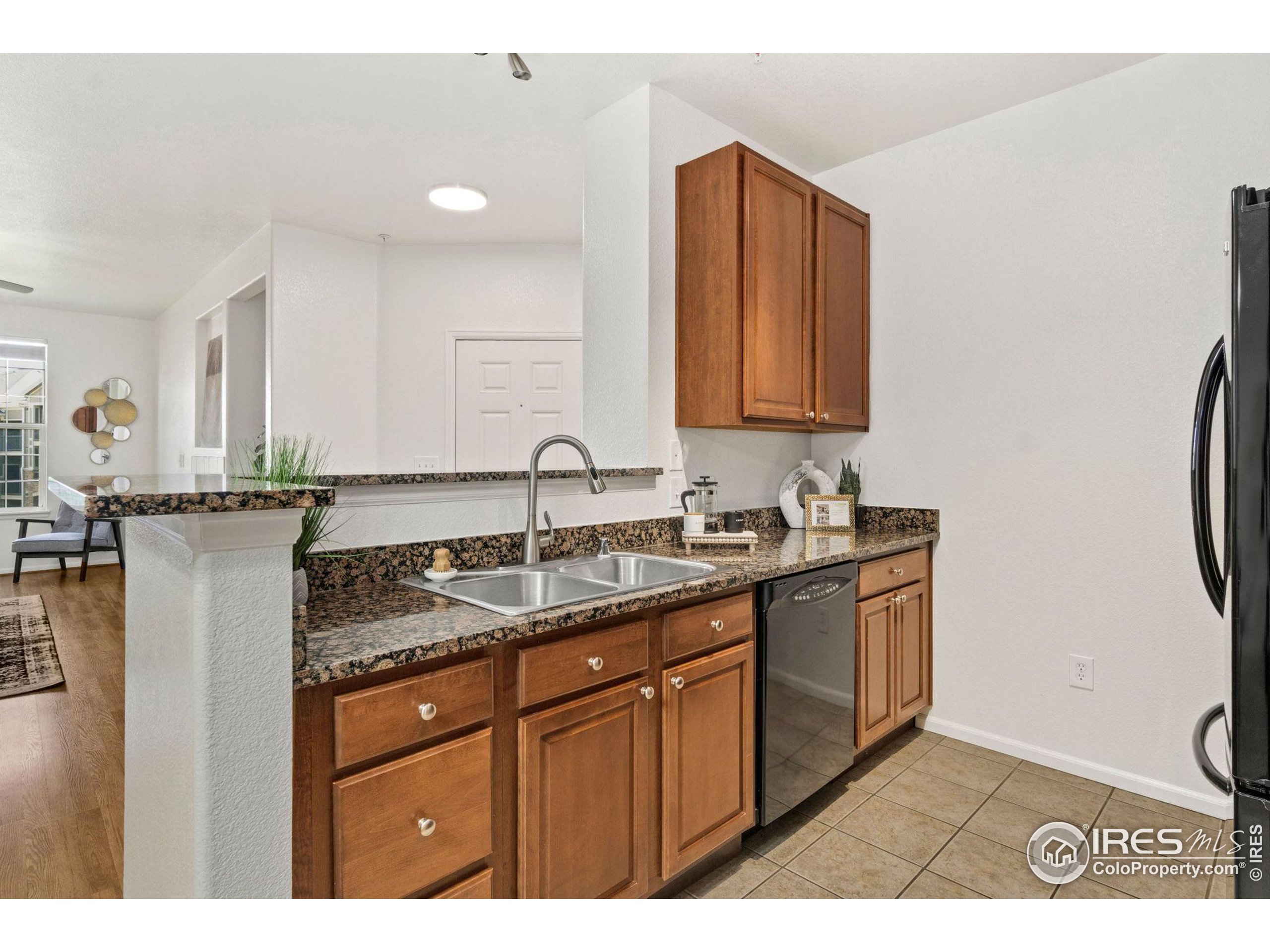 Undisclosed Address Erie, CO 80516 - Photo 5 of 20 a bathroom with a sink and a mirror