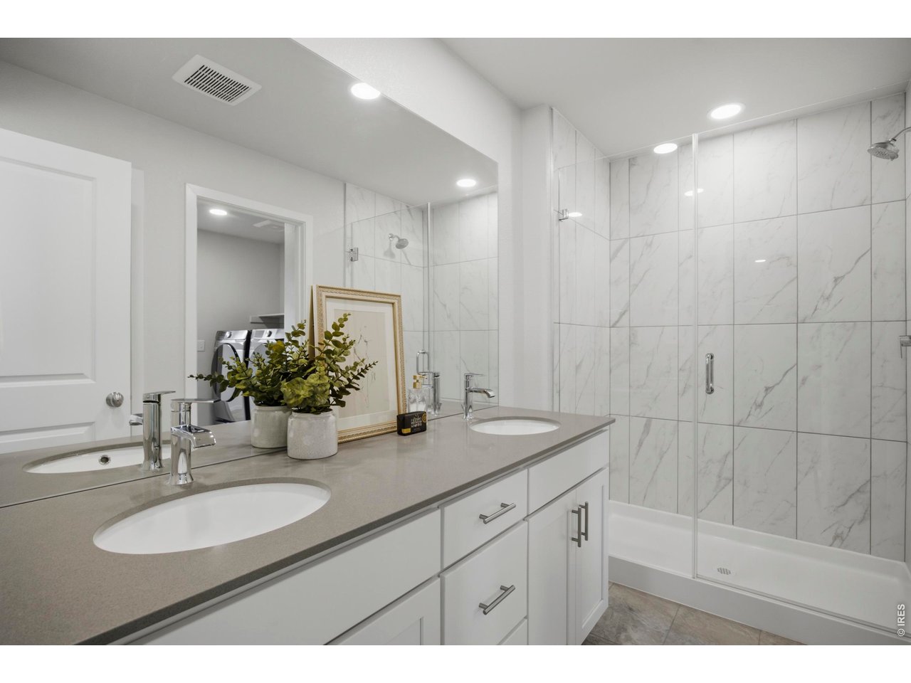 5230 Rendezvous Parkway Timnath, CO 80547 - Photo 20 of 31 Primary Bathroom Featuring a Walk-In Shower and Double Sinks