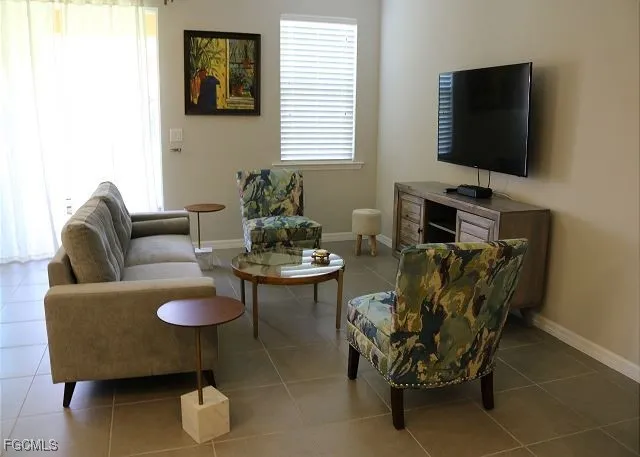 a view of a lake with houses in the back