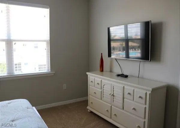 a kitchen with windows and sink
