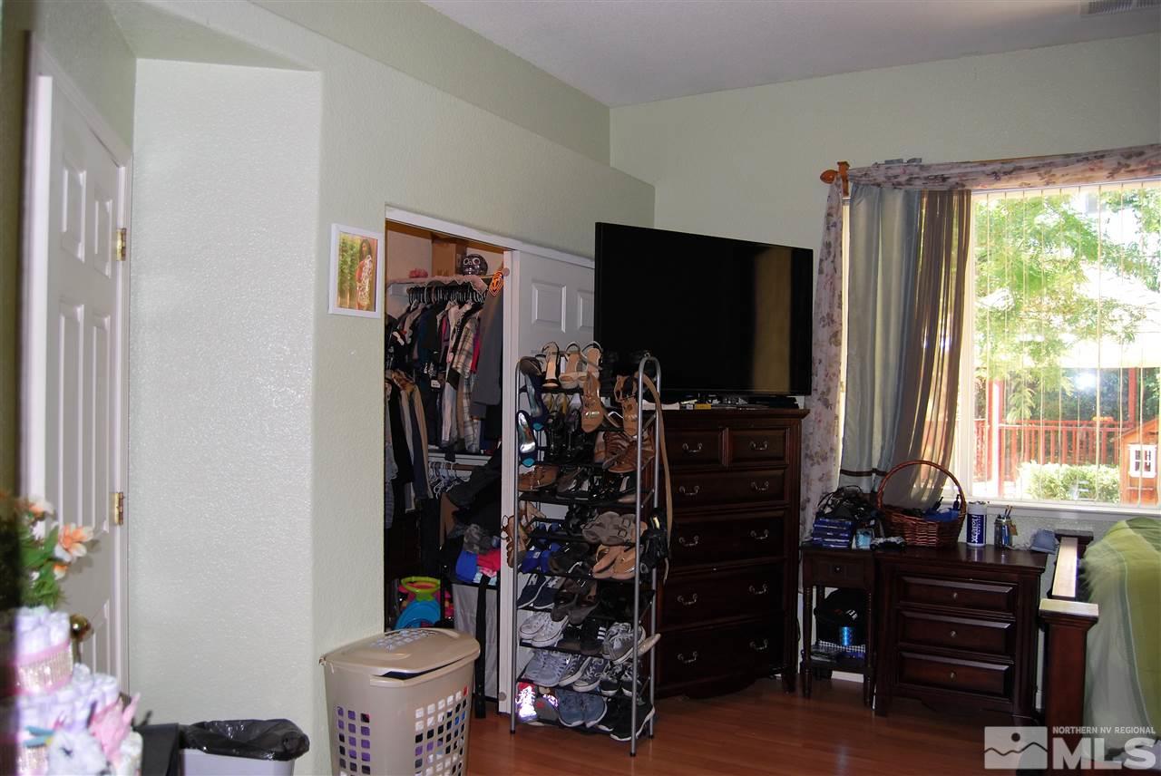 2355 Keystone Avenue Reno, NV 89503 - Photo 10 of 14 a room room with a flat screen tv and a window