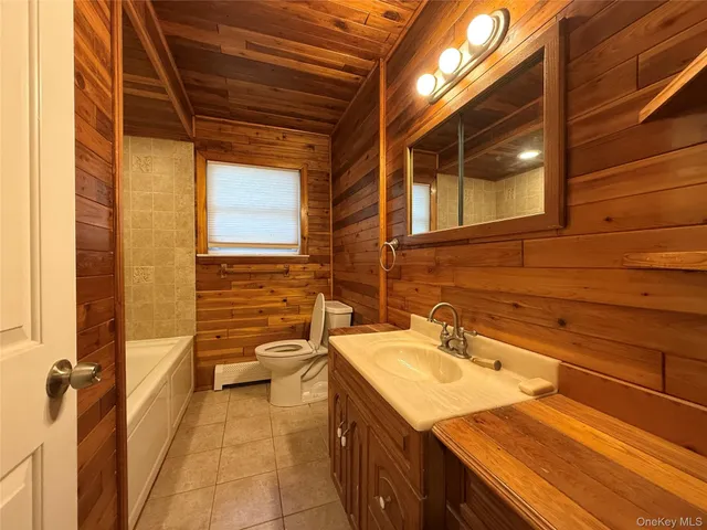 $499,999 | 50 Newcomb Trail, Ridge, NY 11961