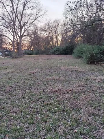 a view of an outdoor space and covered with green space