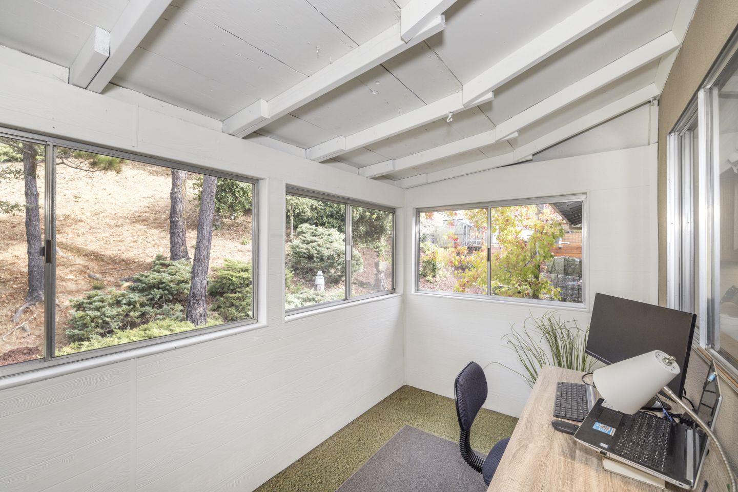 27975 Edgecliff Way Hayward, CA 94542 - Photo 15 of 58 a view of a dining room with furniture window and outside view