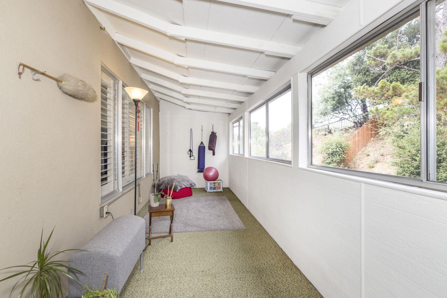 27975 Edgecliff Way Hayward, CA 94542 - Photo 16 of 58 a living room with furniture and a potted plant