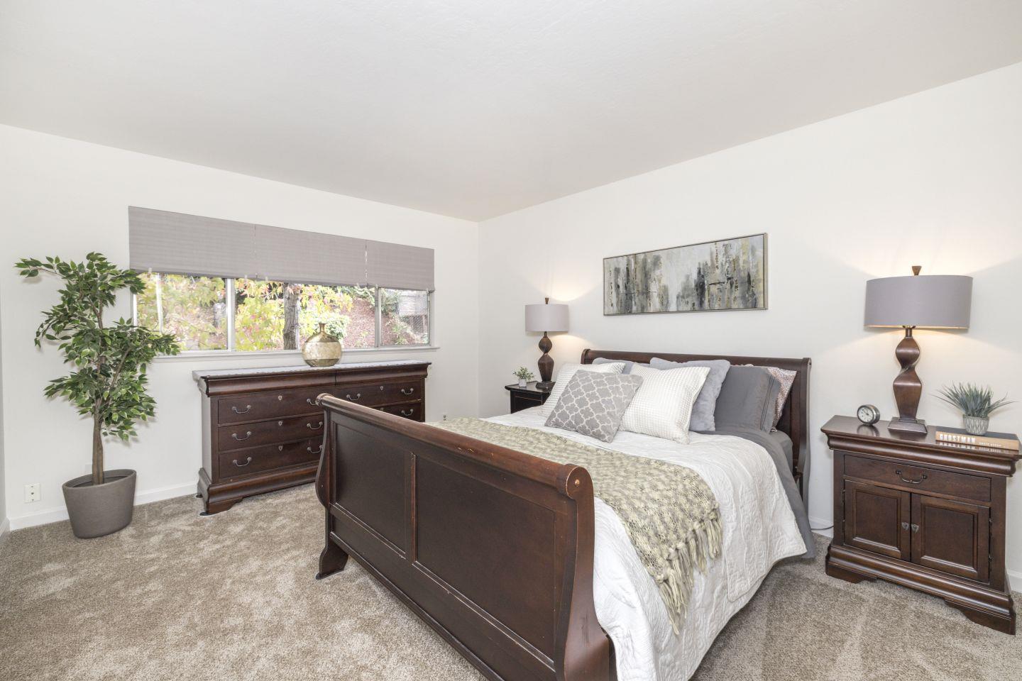 27975 Edgecliff Way Hayward, CA 94542 - Photo 27 of 58 a bedroom with a bed and a potted plant