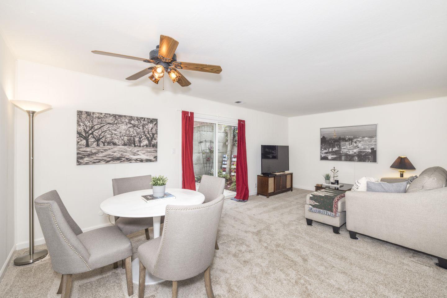 27975 Edgecliff Way Hayward, CA 94542 - Photo 34 of 58 a living room with furniture a chandelier and a window