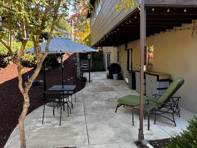 27975 Edgecliff Way Hayward, CA 94542 - Photo 45 of 58 a view of a patio with table and chairs and potted plants