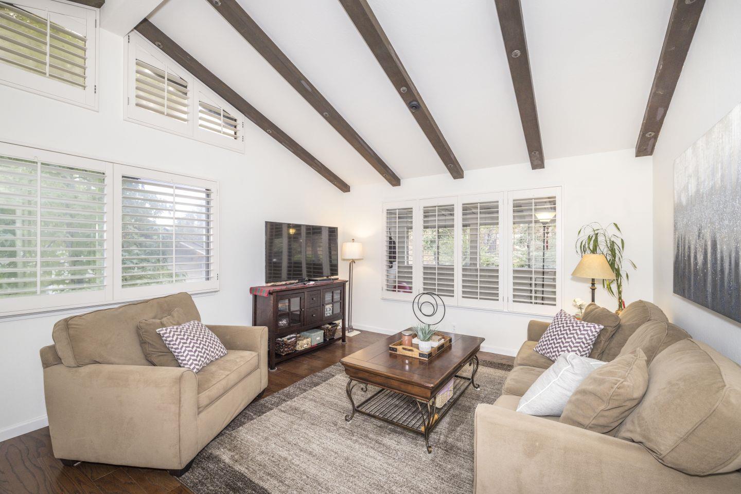 27975 Edgecliff Way Hayward, CA 94542 - Photo 9 of 58 a living room with furniture and a flat screen tv