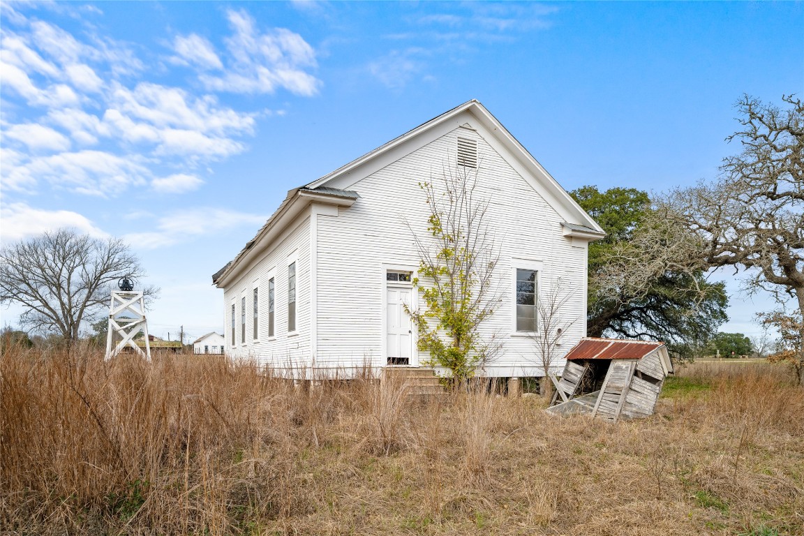 0 North 3rd Street Muldoon, TX 78949 - Photo 3 of 15 a view of a house with backyard