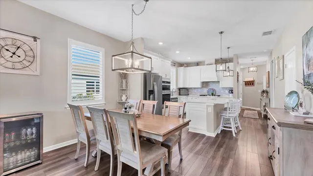 a living room with furniture and windows