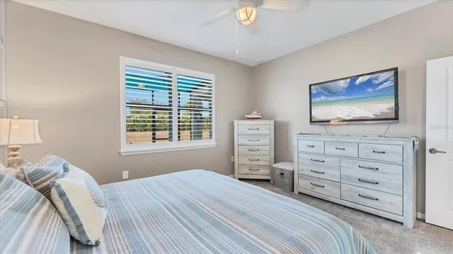a spacious bathroom with a double vanity sink a large mirror of shower
