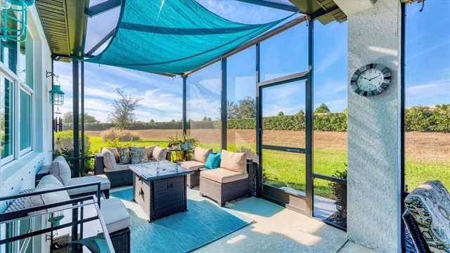 a view of a house with backyard and garden