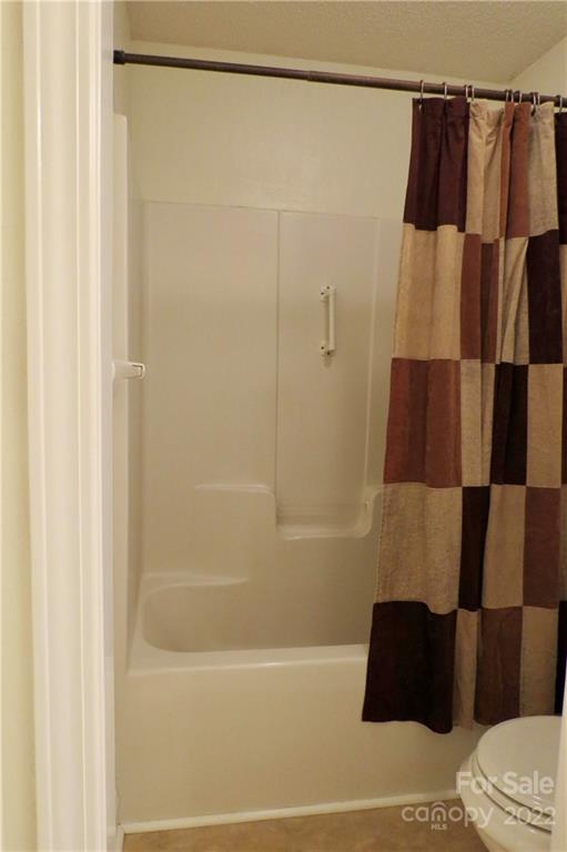 383 Maple Ridge Circle Salisbury, NC 28147 - Photo 27 of 36 a bathroom with a bathtub and a shower