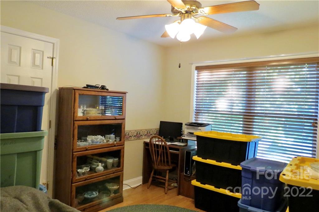 383 Maple Ridge Circle Salisbury, NC 28147 - Photo 28 of 36 a view of a workspace with furniture and a window