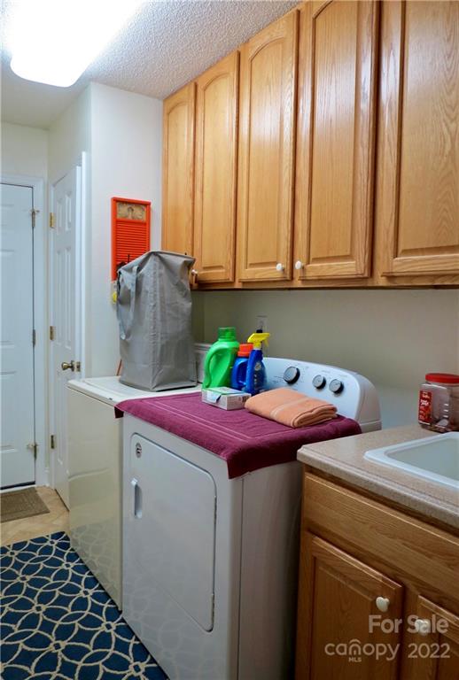 383 Maple Ridge Circle Salisbury, NC 28147 - Photo 30 of 36 a utility room with dryer and washer