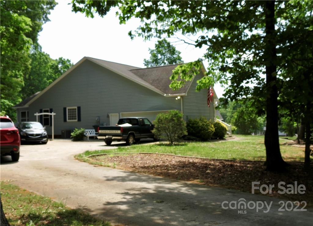383 Maple Ridge Circle Salisbury, NC 28147 - Photo 3 of 36 a view of a house with a patio