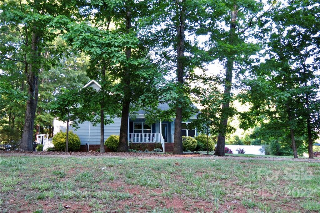 383 Maple Ridge Circle Salisbury, NC 28147 - Photo 36 of 36 a view of a backyard with large trees