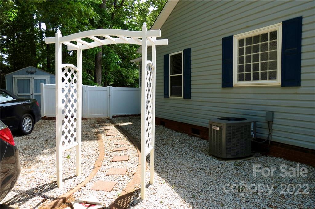 383 Maple Ridge Circle Salisbury, NC 28147 - Photo 7 of 36 a view of a house with backyard and porch