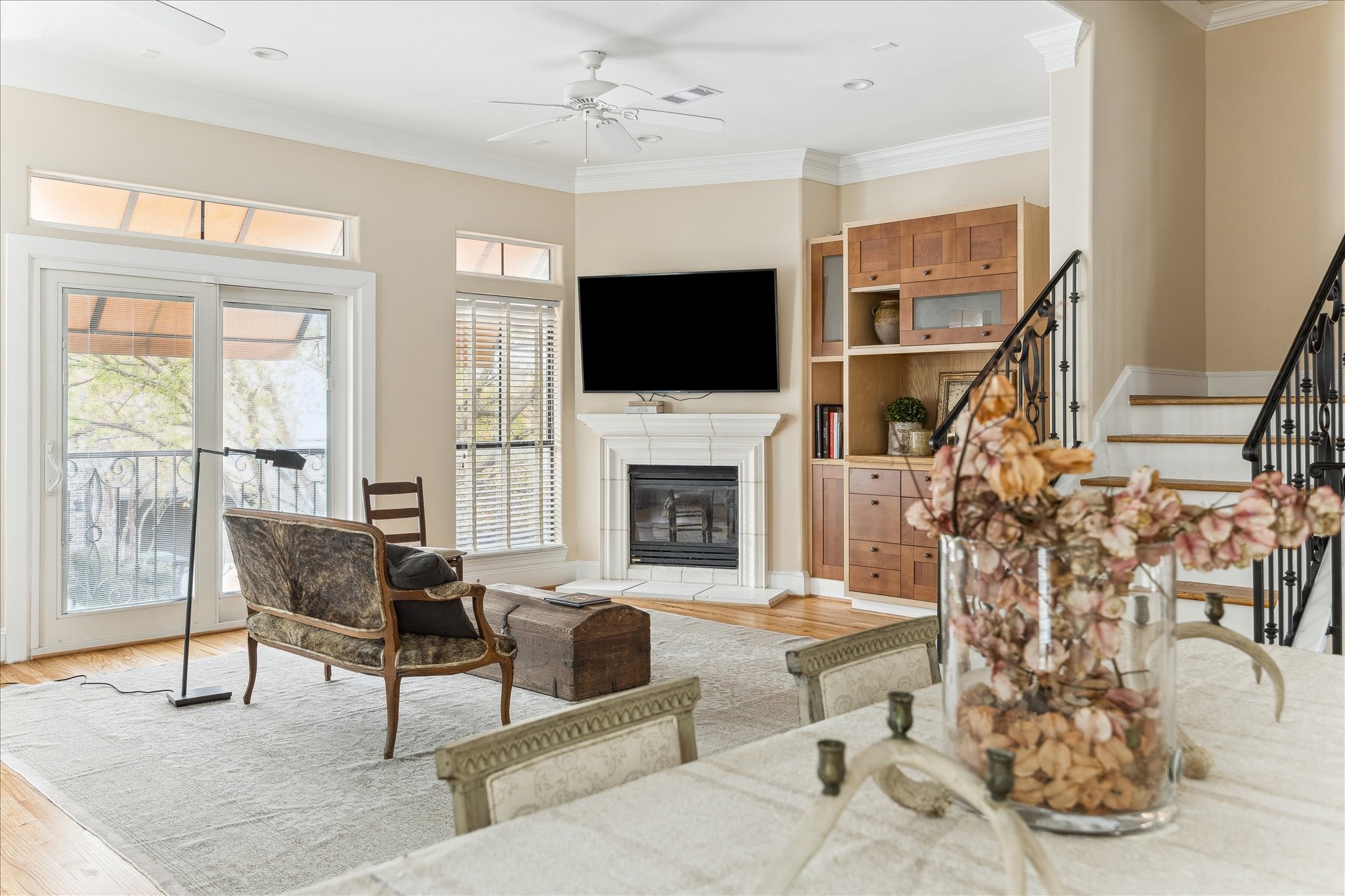 3515 Yupon Street Houston, TX 77006 - Photo 7 of 41 a living room with furniture a flat screen tv and a fireplace