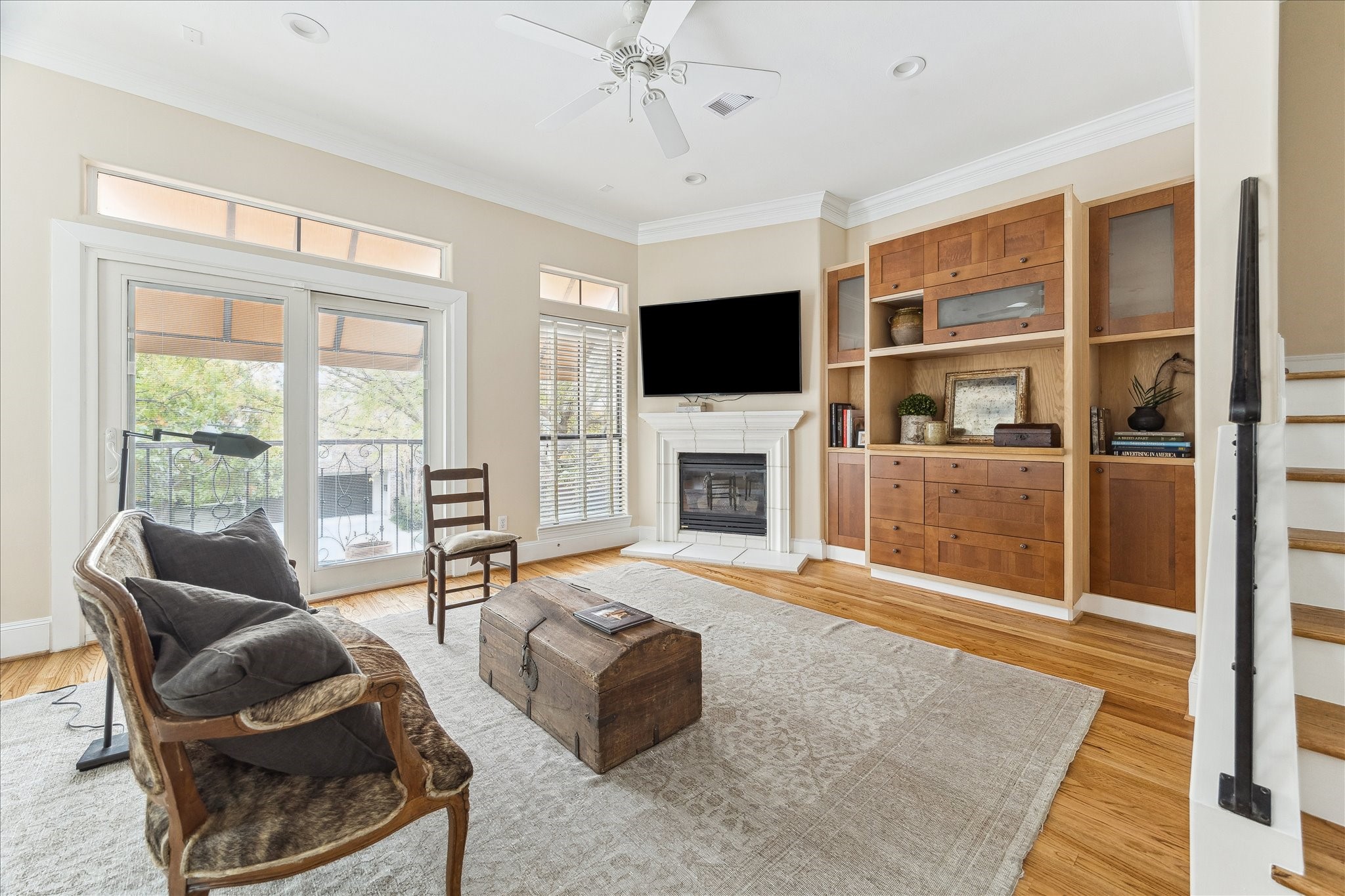 3515 Yupon Street Houston, TX 77006 - Photo 8 of 41 a living room with furniture a flat screen tv and a fireplace