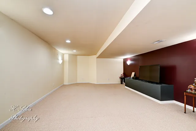 a view of a livingroom with furniture and a window