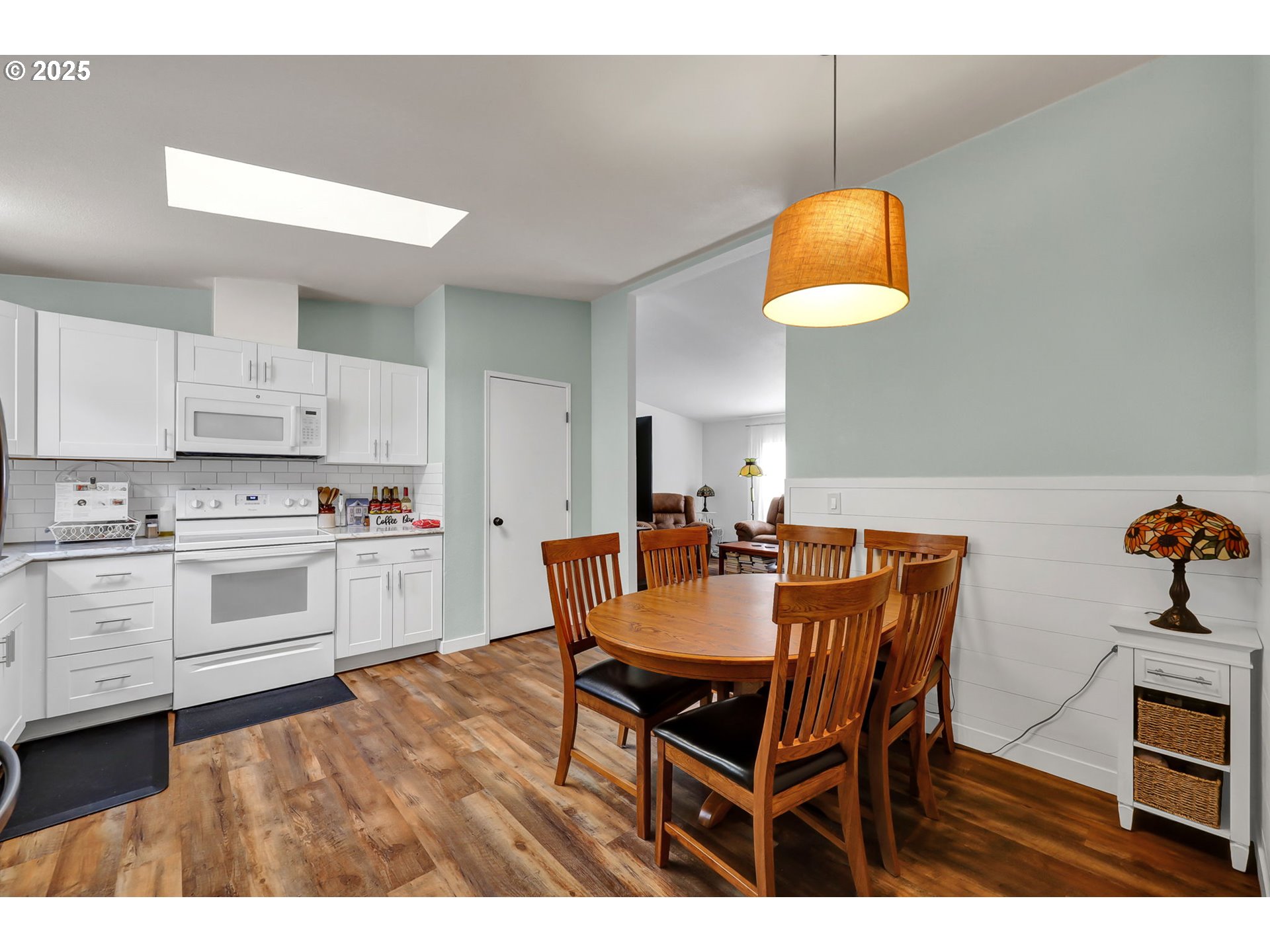 991 Main Street Monroe, OR 97456 - Photo 12 of 48 a view of a dining room with furniture and wooden floor