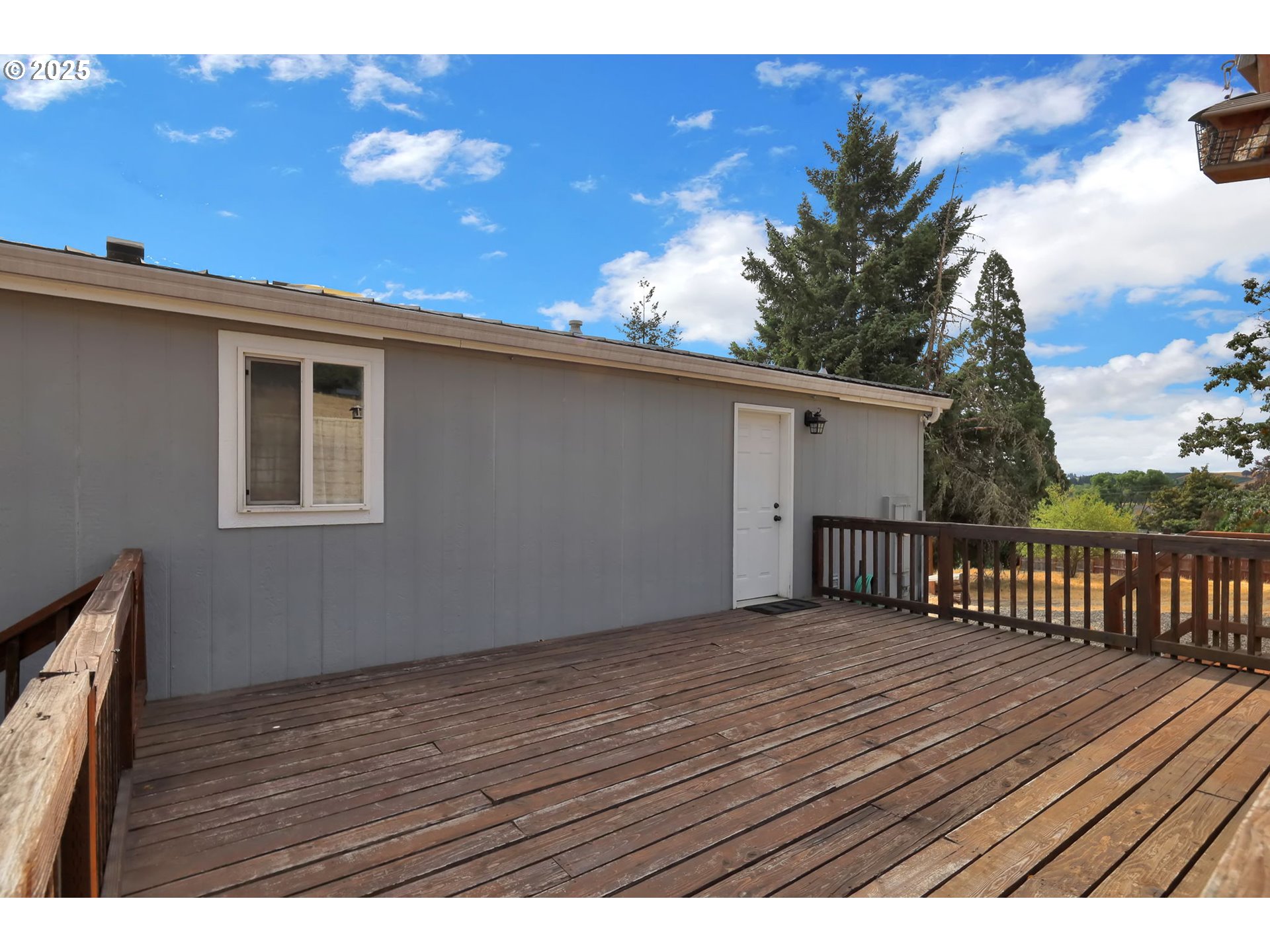 991 Main Street Monroe, OR 97456 - Photo 27 of 48 a view of backyard with a deck