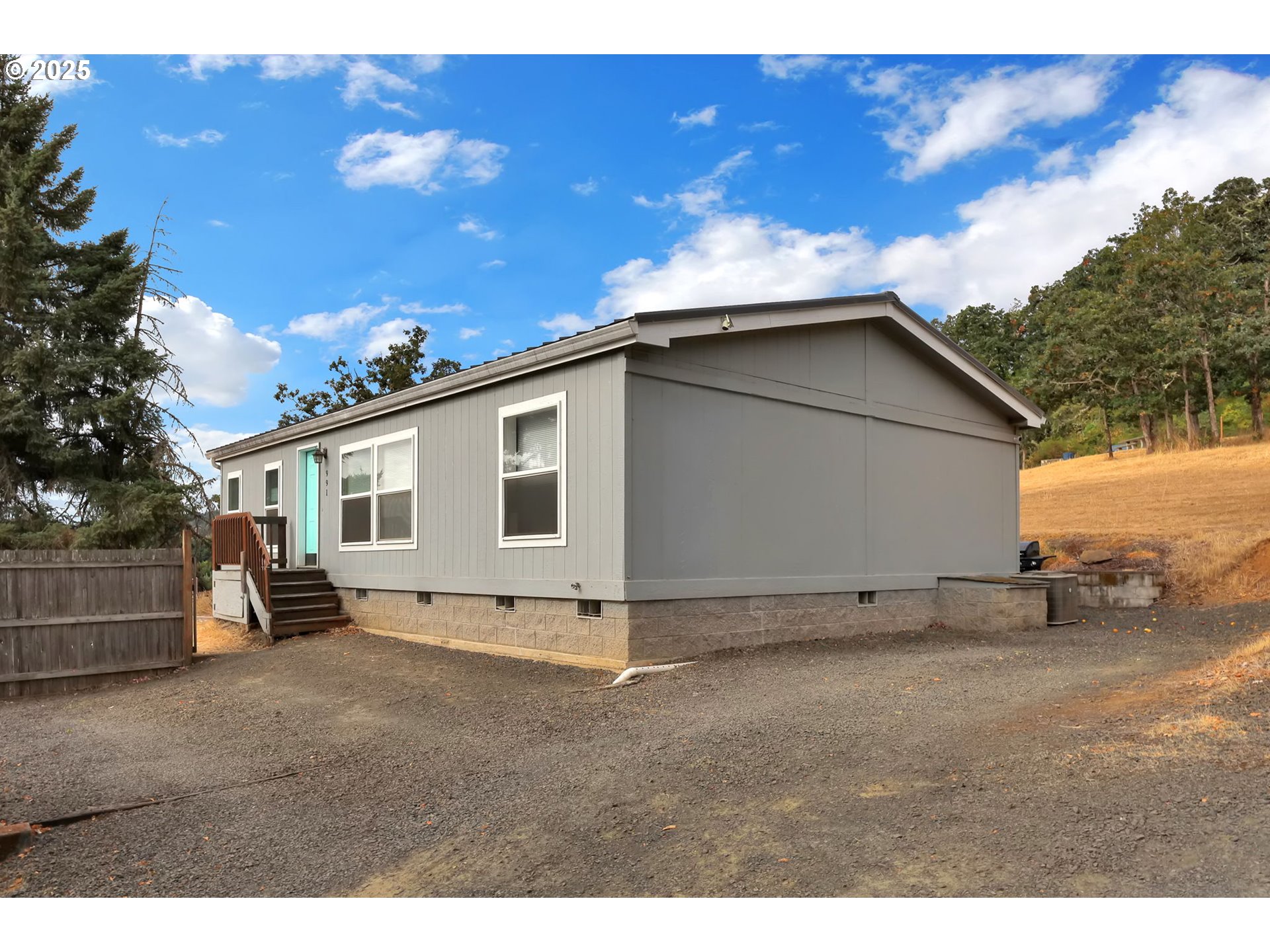 991 Main Street Monroe, OR 97456 - Photo 29 of 48 a view of a house with a patio