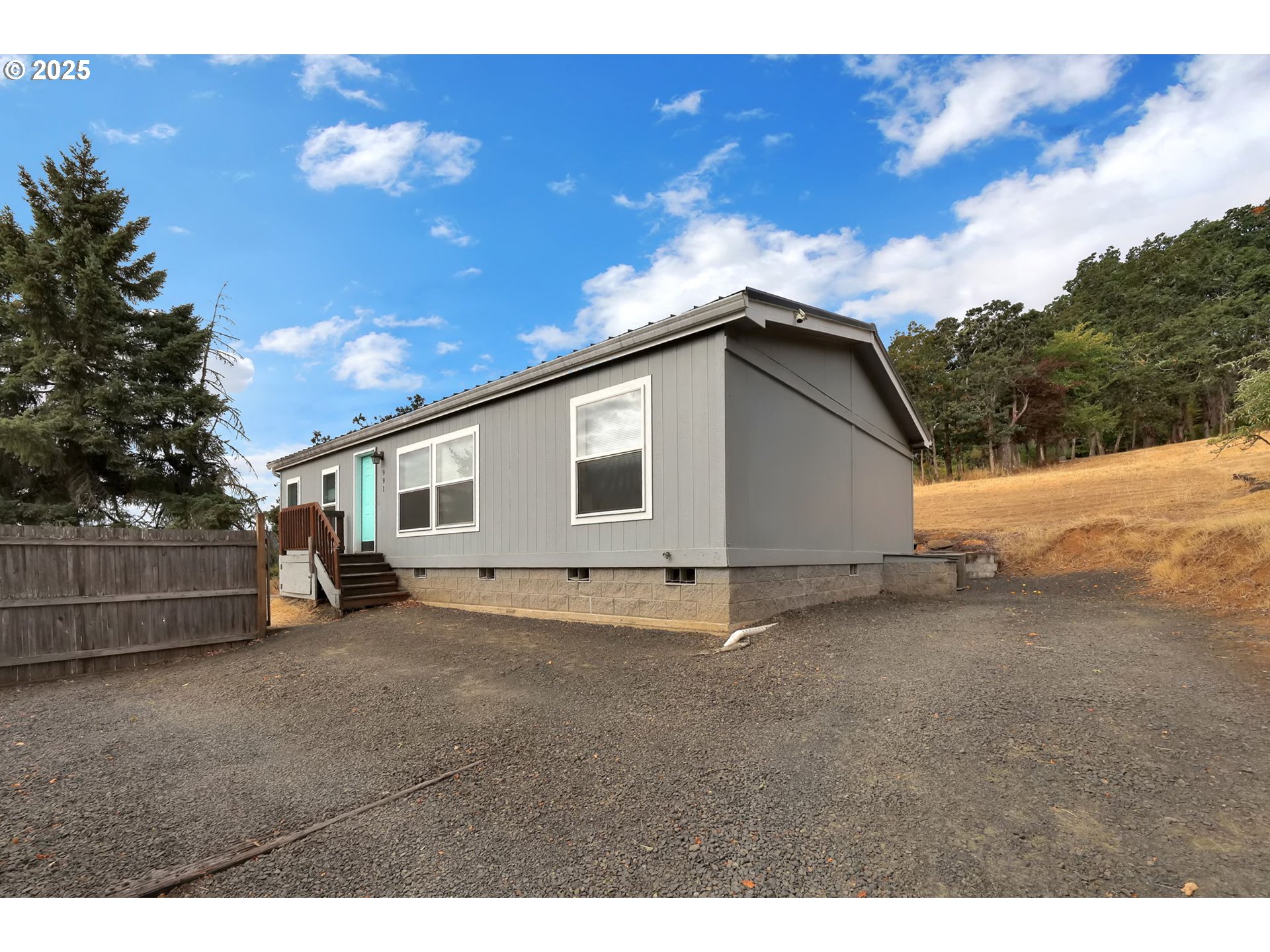 991 Main Street Monroe, OR 97456 - Photo 30 of 48 a view of a house with a patio